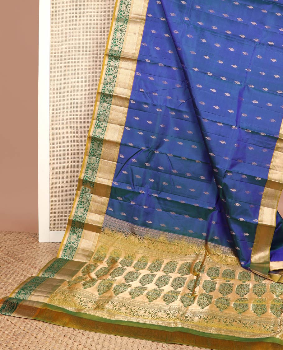 Blue buttas silksaree, contrast border of rekku,kathir,kuyil kann, yaanai & mayil & pallu of meenakari Mughal-style floral bunches