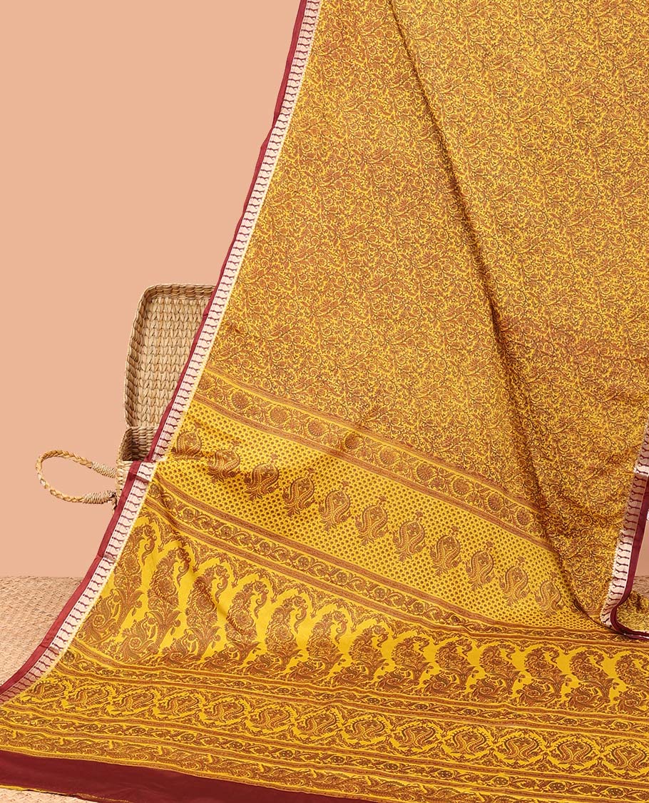 Yellow floral printed semi-banaras printed saree, paisley motifs border & intricate paisley motifs border