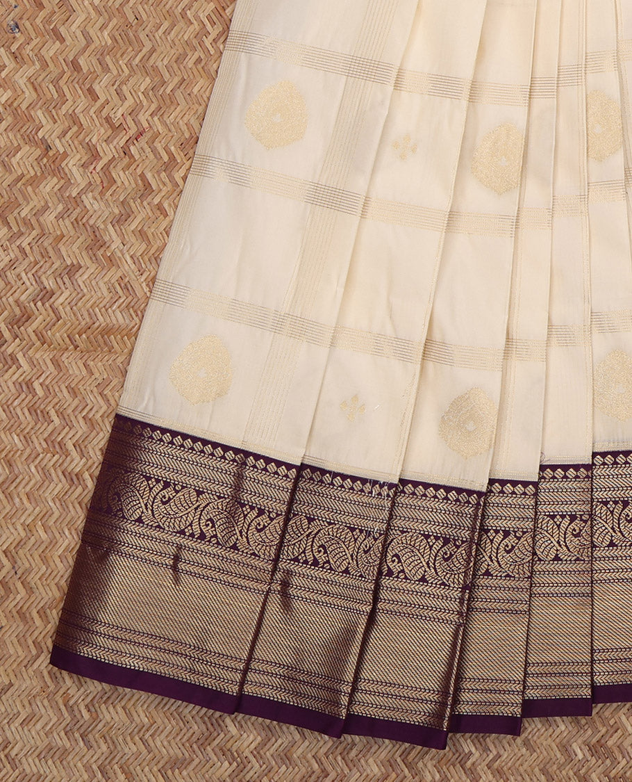 Cream Budget Silk Saree, Mesmerized with Zari Butta Enclosed Checks, a Contrast Traditional Zari Border, Grand Pallu, and a Contrast Blouse