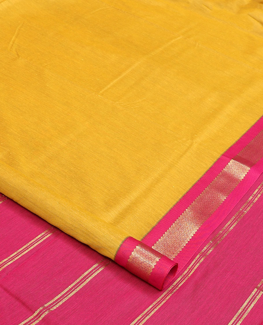 Yellow plain nine-yard cotton saree, contrast traditional zari border, and striped pallu