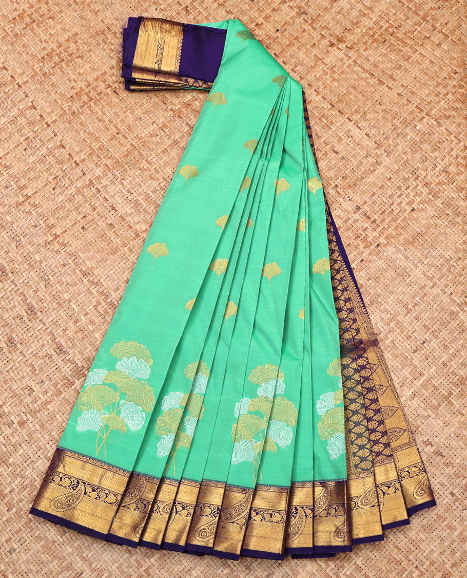 Green Budget Silk Saree, Meticulously Crafted with Leaf Buttas, Complemented by a Contrast Paisley Zari Border, Intricate Pallu, and Contrast Blouse