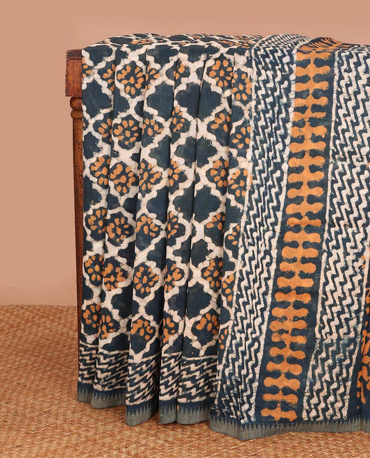 Blue batik style ogee printed mul mul cotton saree, batik printed border, and pallu of geometric print