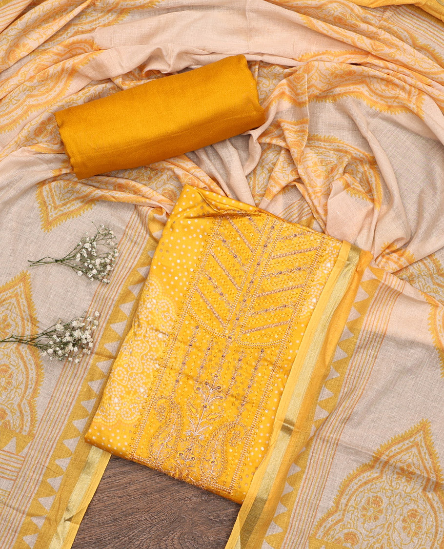 Yellow Material Chudidar Set, Accentuated with Bandhani Dot Printed and Embroidery on Rayon Top, a Rayon Bottom, and Paired with Contrast Intricately Printed Cotton Dupatta