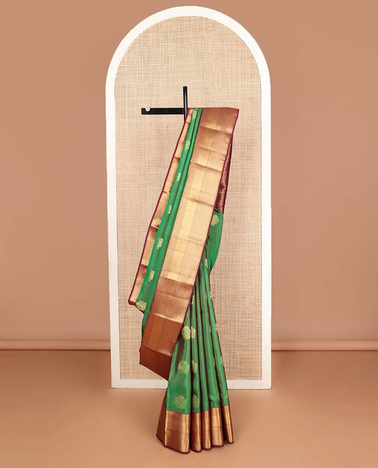 Green zari buttas Vasundhara silk mix saree, contrast border of rekku,diamond & jaal designs & pallu of rekku,rudraksham,manga & kodi visiry