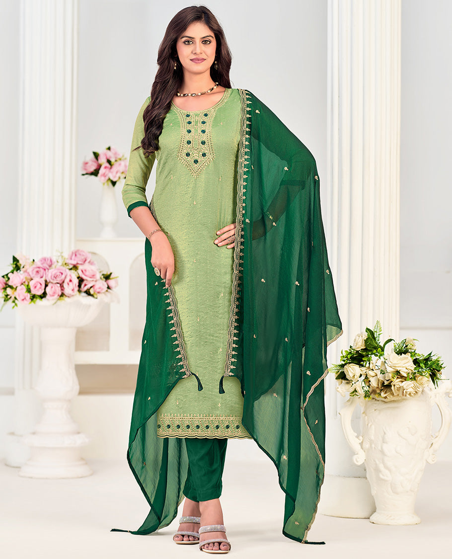 Pista green churidar material set, neck embroidered with stone work top, contrast plain bottom, and scallop embroidered dupatta