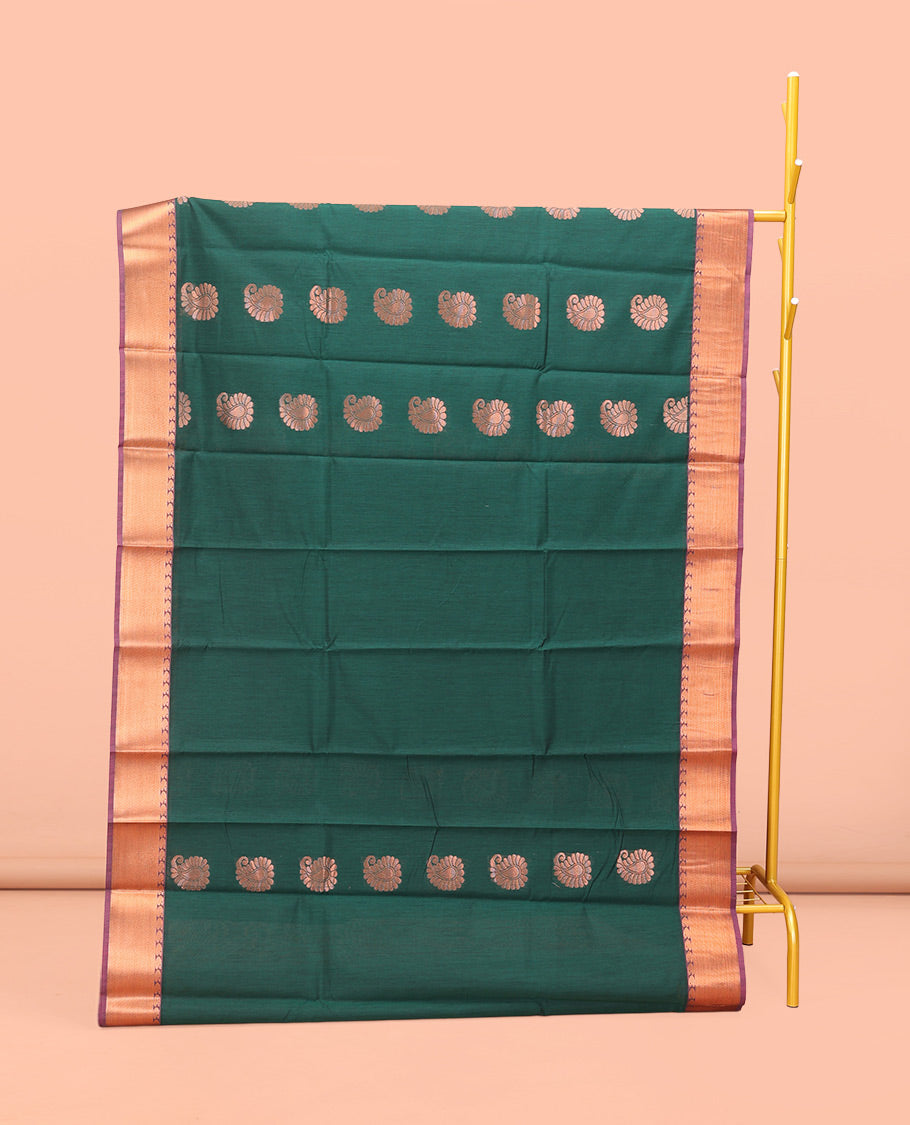 Green Semi-Silk Cotton Saree, Prettified with Paisley Buttas on Its Body, Complemented by Contrast Zari Border, Pallu Steeped with Paisley Designs, and Paired with a Matching Blouse