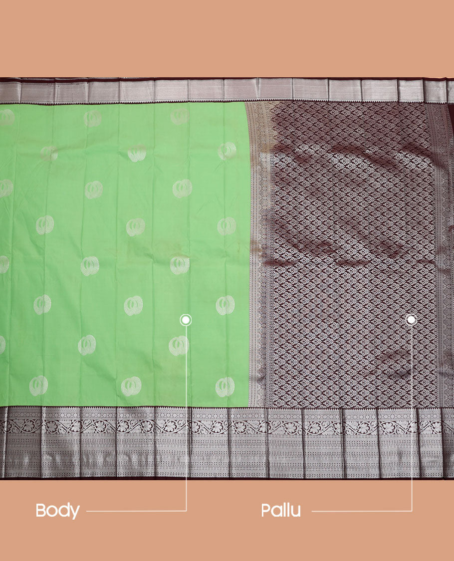 Green Budget Silk Saree, Sparsely Threaded with Buttas All Over Its Body, Complemented by a Contrast Traditional Zari Design Border, Grand Pallu, and Paired with a Contrast Blouse