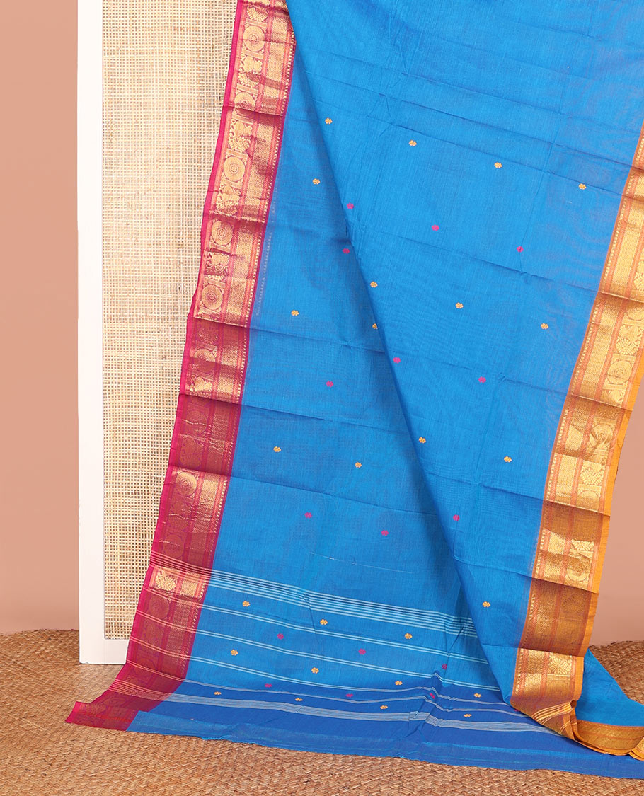 Blue Chettinad Cotton Saree Mesmerized with Thread Buttas All Over Its Body, Complemented by a Contrast Traditional Zari Motifs Woven Ganga Jamuna Border, and a Pallu of Stripes and Buttas