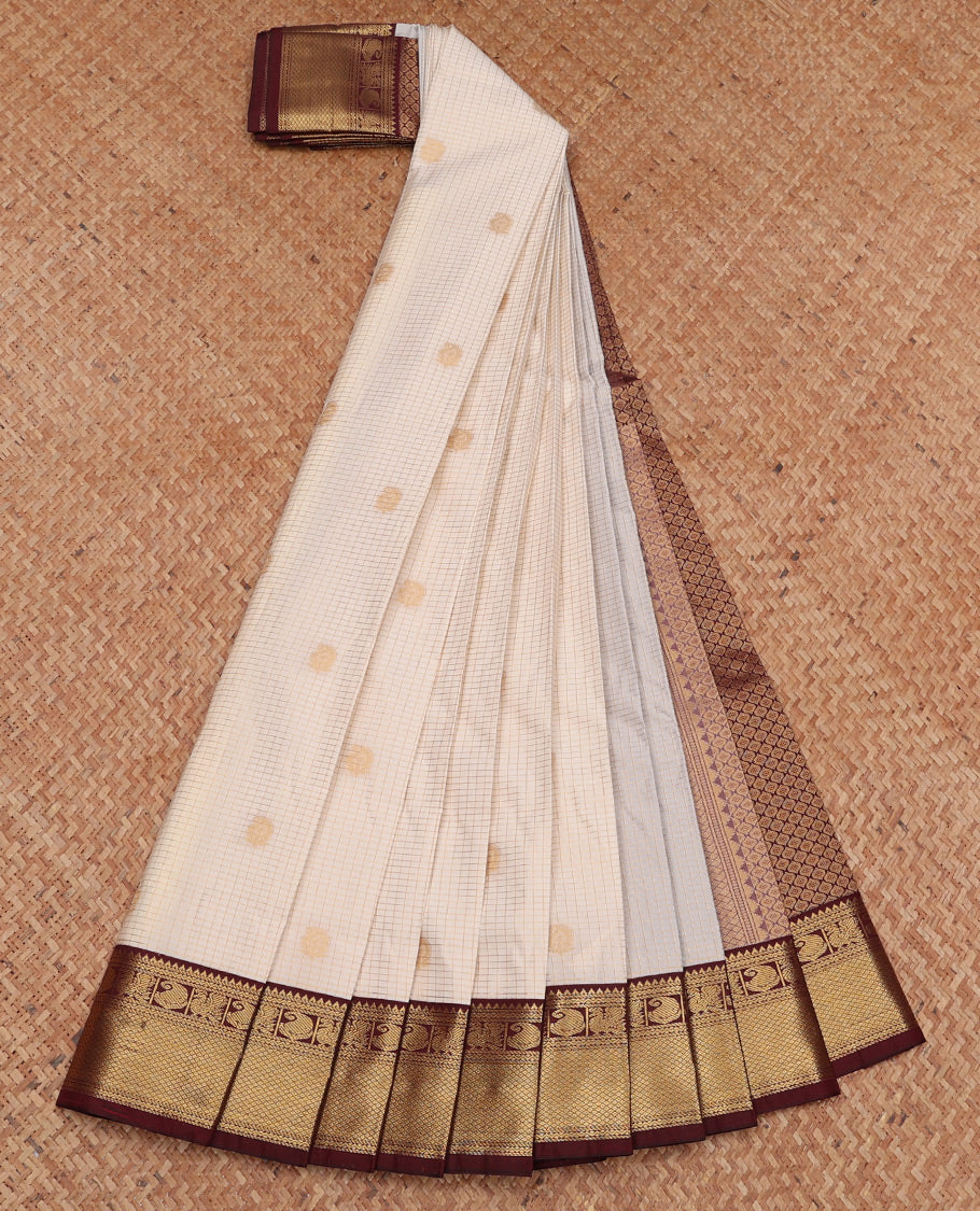 Off-White Budget Silk Saree, Subtly Sparkled with Zari Butta and Checks, Complemented by a Contrast Traditional Zari Border, Jaal Pallu, and Contrast Blouse