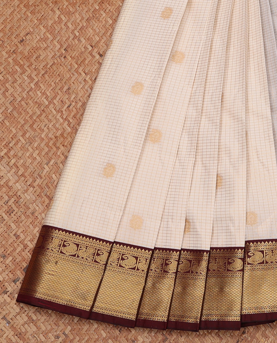 Off-White Budget Silk Saree, Subtly Sparkled with Zari Butta and Checks, Complemented by a Contrast Traditional Zari Border, Jaal Pallu, and Contrast Blouse