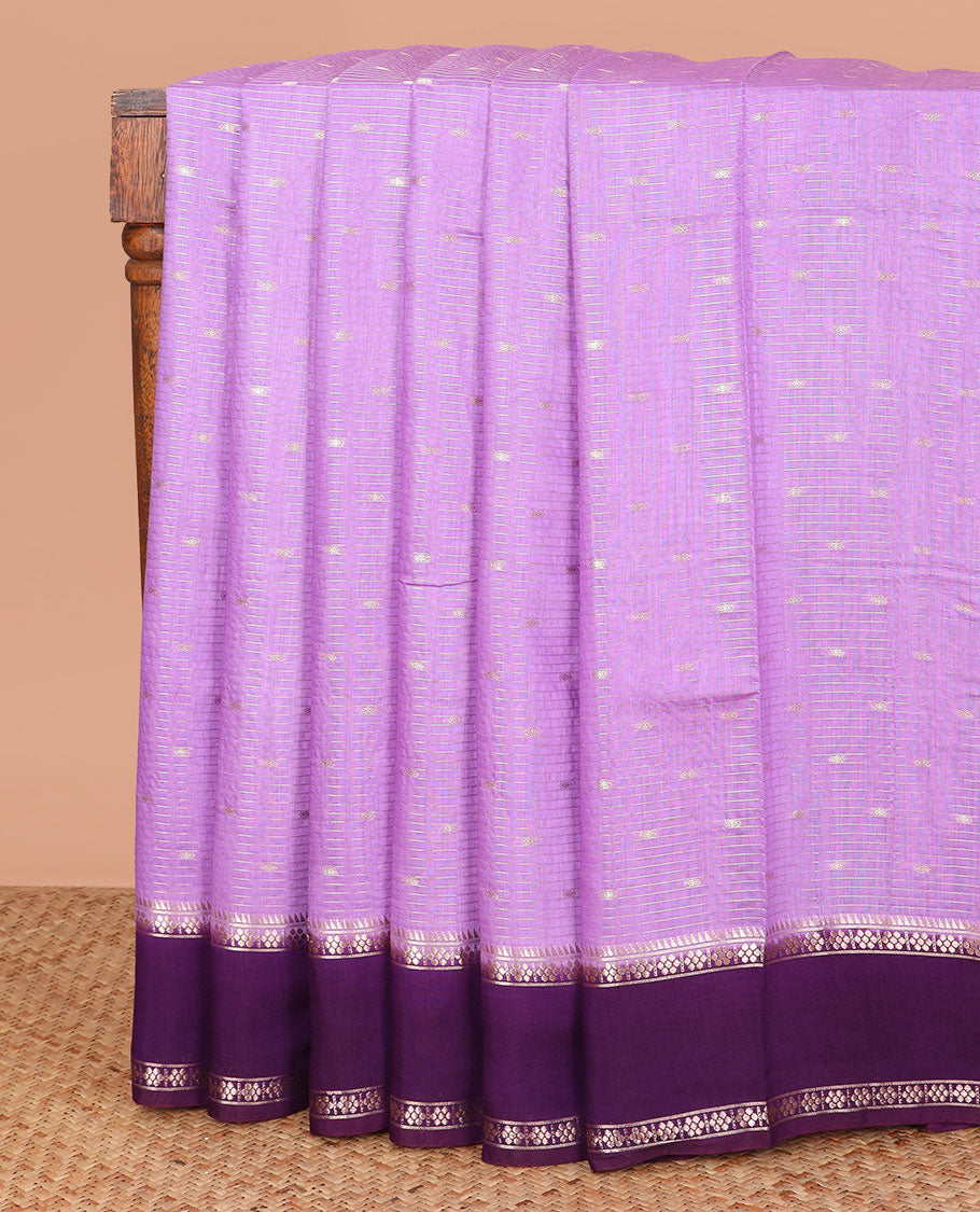 Lavender buttas and striped assam silk saree, contrast traditional zari border, and pallu of zari stripes