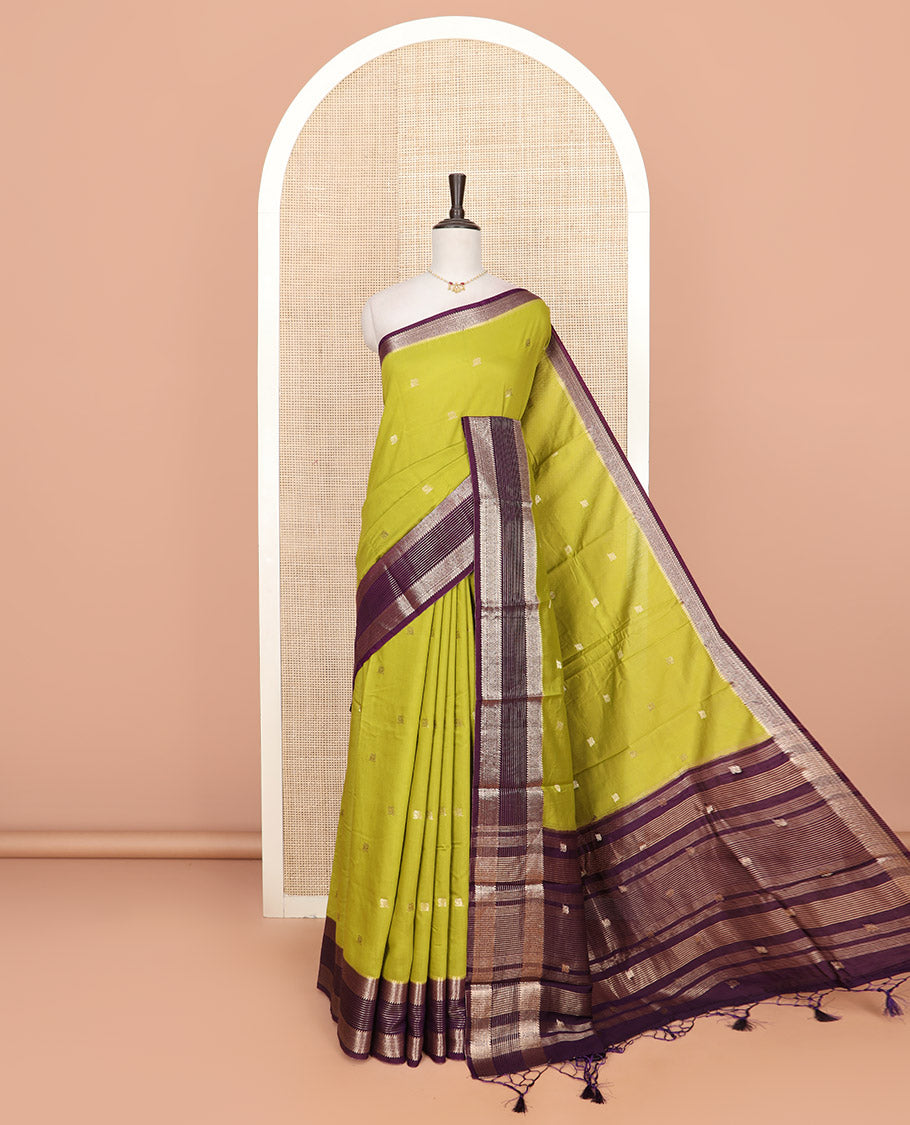 Leaf green peacock buttas Assam silk saree, contrast traditional zari border, and pallu of zari designs