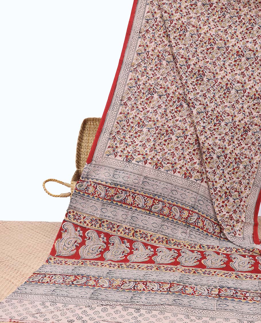 Cream floral design machine-printed kalamkari cotton saree with contrast intricate geometric design border & geometric design pallu