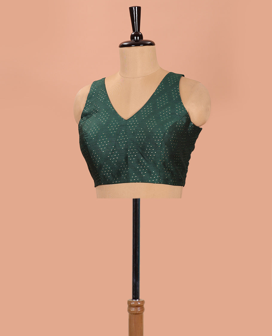 Green Readymade Blouse Steeped with Dobby-Style Buttas, Featuring a Front Leaf-Neck, Back Deep Leaf-Neck, and Sleeveless Hand