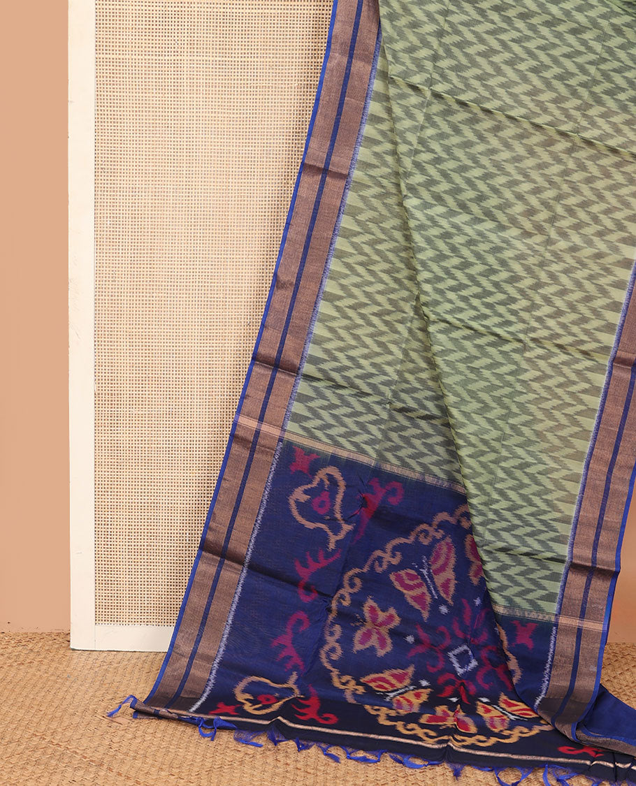 Green ikkat chevron designs silk cotton saree, contrast zari border, and pallu of ikkat designs