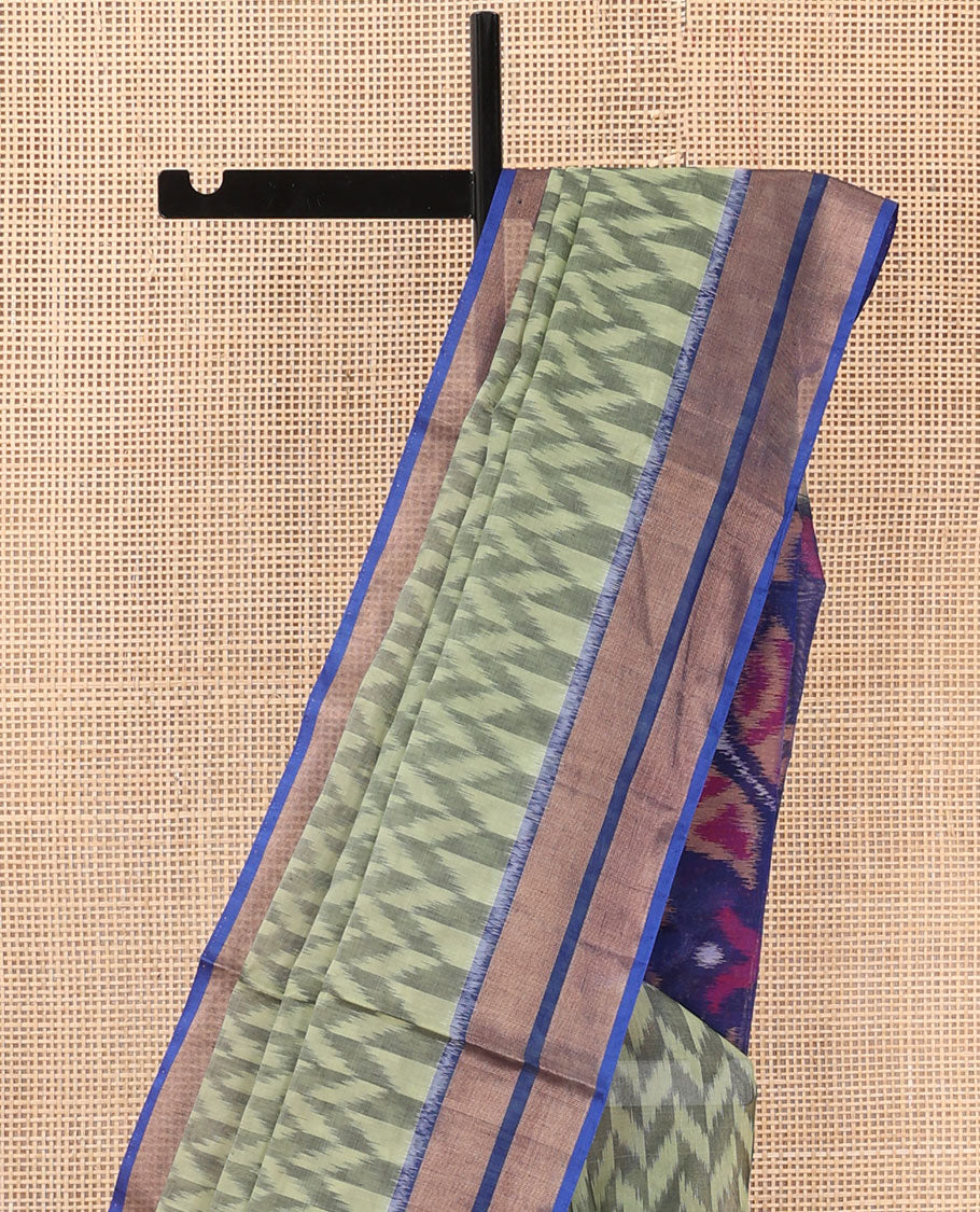Green ikkat chevron designs silk cotton saree, contrast zari border, and pallu of ikkat designs