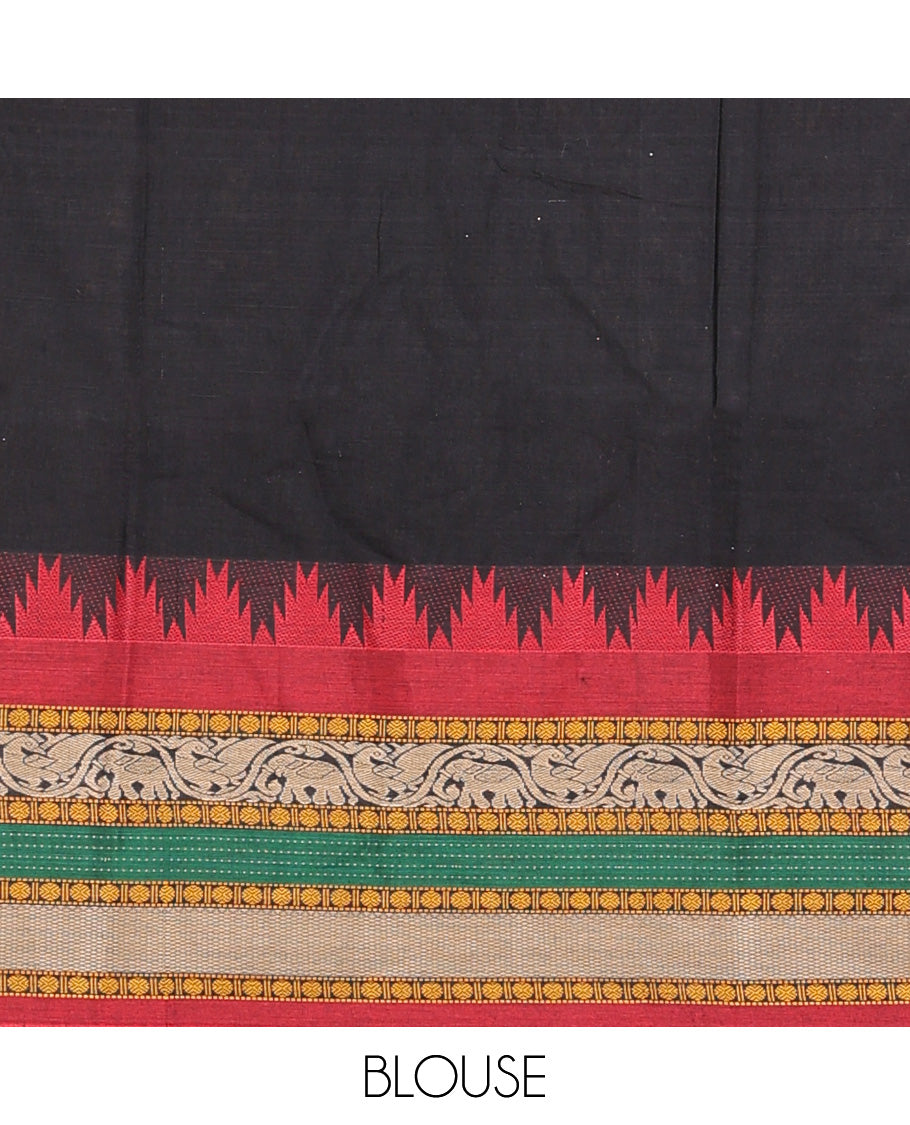 Black cotton half-saree, plain with contrast traditional motif bordered skirt, matching blouse, and contrast elephant motif dhavani