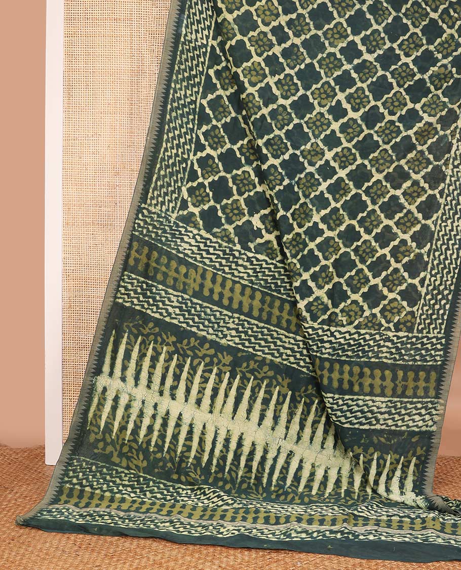 Green batik style ogee printed mul mul cotton saree, batik printed border, and pallu of geometric print