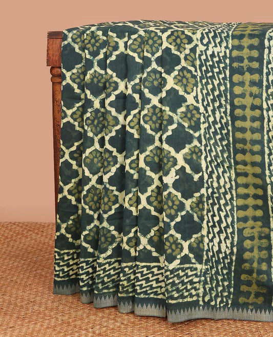 Green batik style ogee printed mul mul cotton saree, batik printed border, and pallu of geometric print