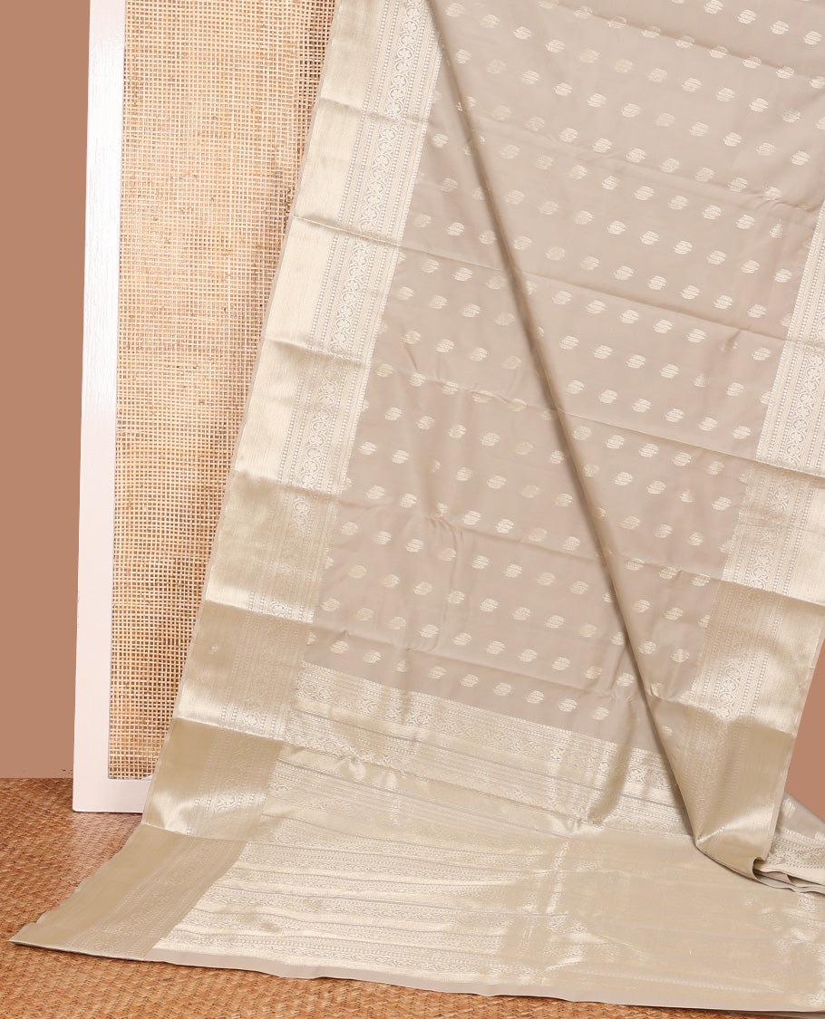 Cream zari buttas Vasundhara silk mix saree, intricate pallu, and zari border of manga, kathir, thilakam, banaras, and kodi visiry, and intricate pallu