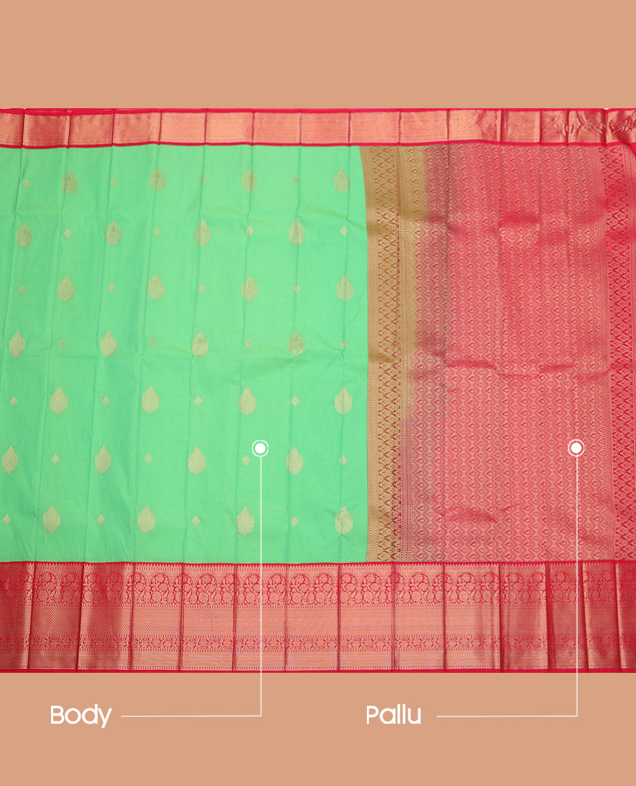 Green Budget Silk Saree, Gleamed Up with Zari Buttas, Complemented by a Contrast Traditional Zari Border, Grand Pallu, and a Contrast Blouse