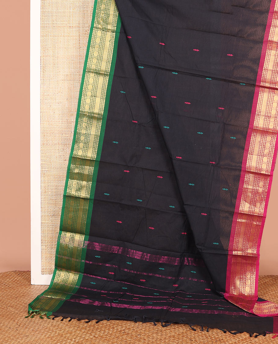 Black Chettinad Cotton Saree Prettified with Thread Buttas All Over Its Body, Complemented by a Contrast Traditional Zari Motifs Woven Ganga Jamuna Border, and a Pallu of Stripes and Buttas