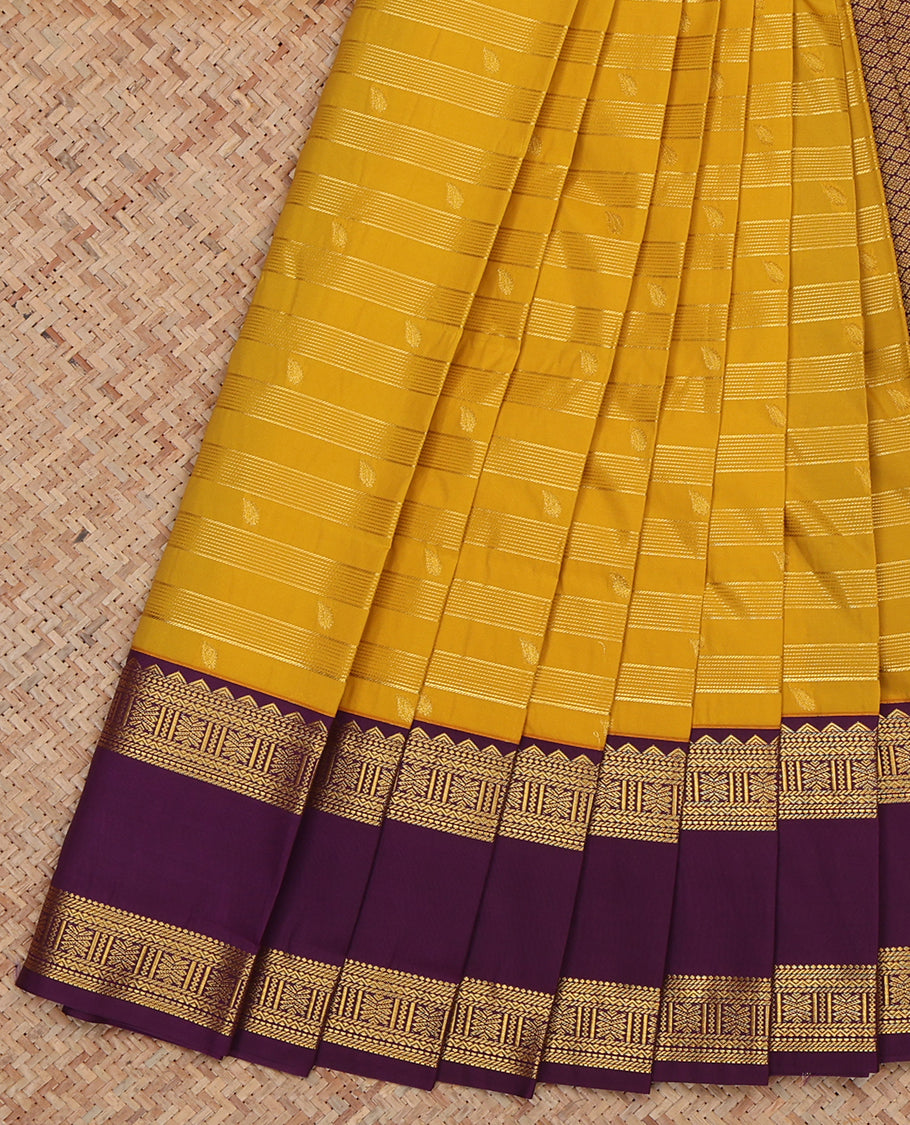 Mustard Budget Silk Saree, Styled with Zari Buttas and Stripes, Complemented by a Contrast Traditional Rettai Pettu Zari Border, Grand Jaal Pallu, and Contrast Blouse