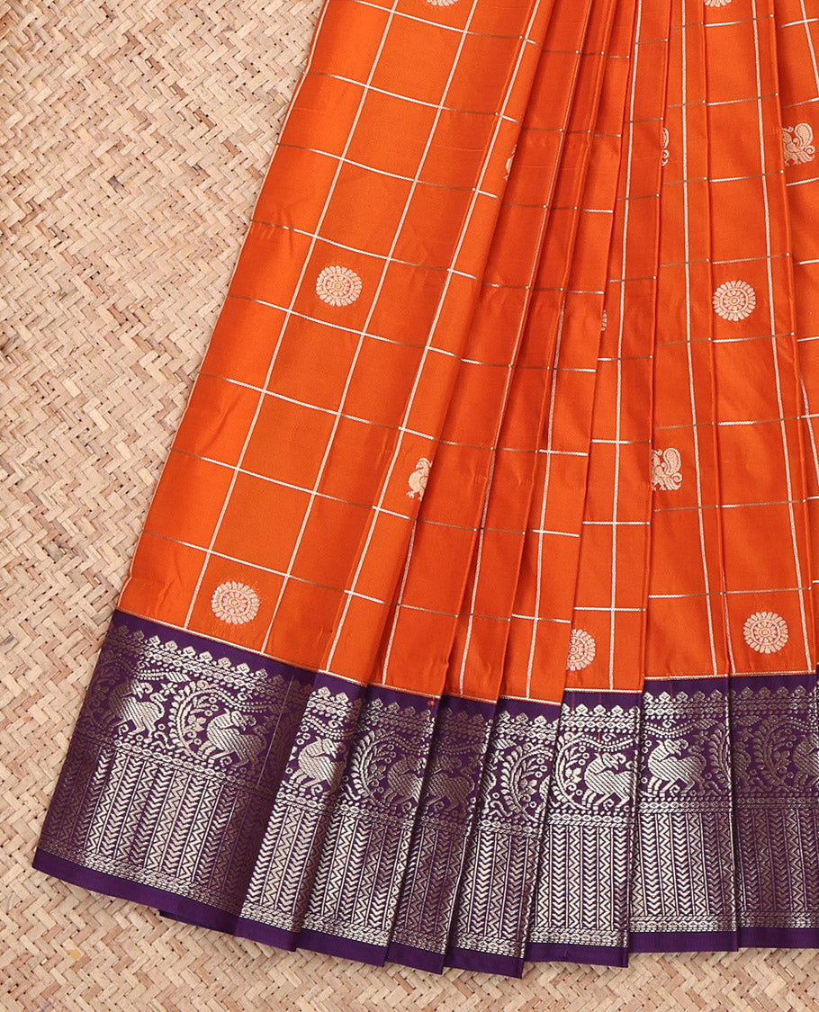 Orange Budget Silk Saree, Elevated with Peacock-Chakram Butta Enclosed Checks, Contrast Yaali Motifs Featured Border, Grand Jaal Pallu, and a Contrast Blouse