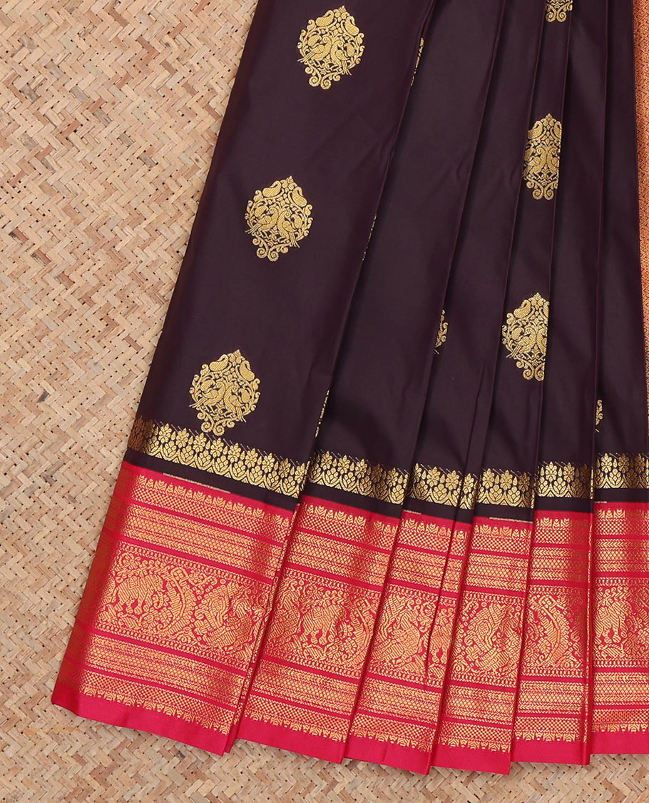 Wine Budget Silk Saree, Ornamented with Zari Buttas, Complemented by Contrast Traditional Zari Border, a Jaal Pallu and a Matching Blouse