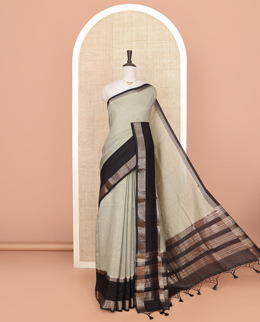 Light grey zari checked Assam silk saree, contrast traditional zari border of floral designs, and pallu of zari designs