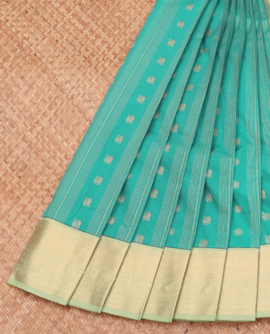Green Budget Silk Saree, Sparsely Threaded with Peacock Buttas and Stripes, Complemented by a Contrast Traditional Zari Border, Grand Pallu, and a Contrast Blouse