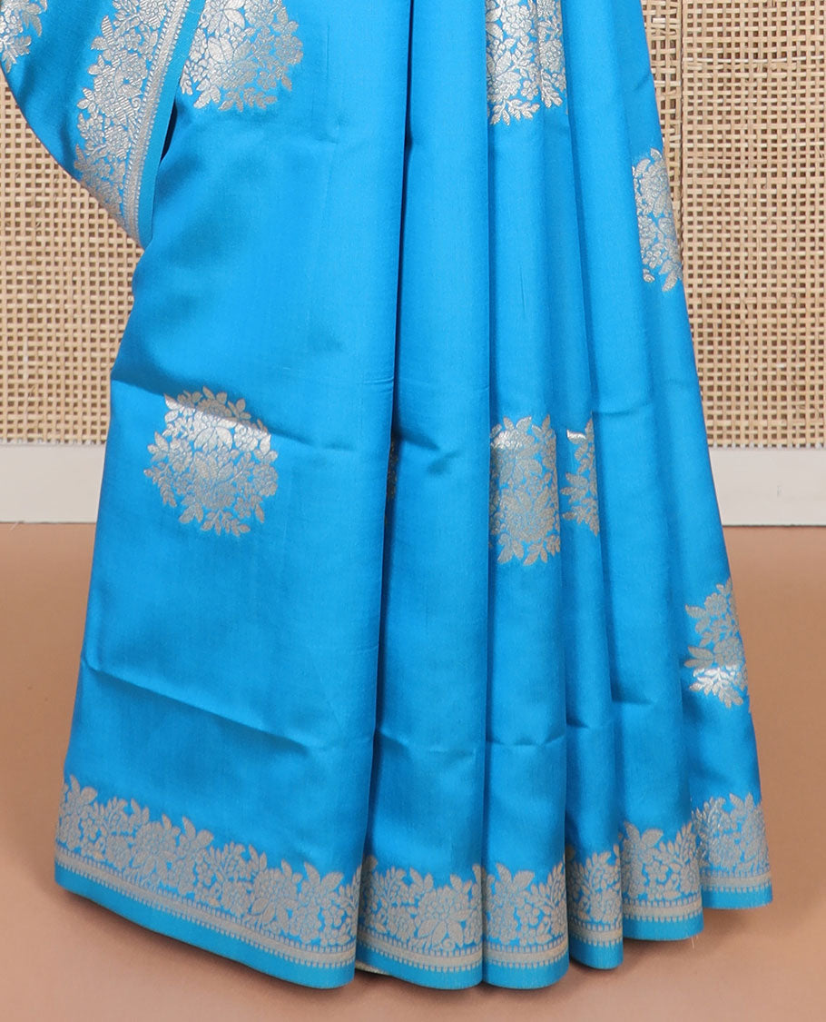 Blue floral motifs butter silk silk saree with self floral zari design border & floral design pallu