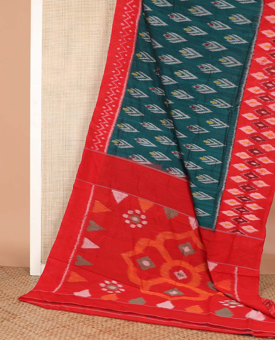 Green buttas ikkat cotton saree, contrast ikkat border, and pallu of big kolam-style design ikkat weave