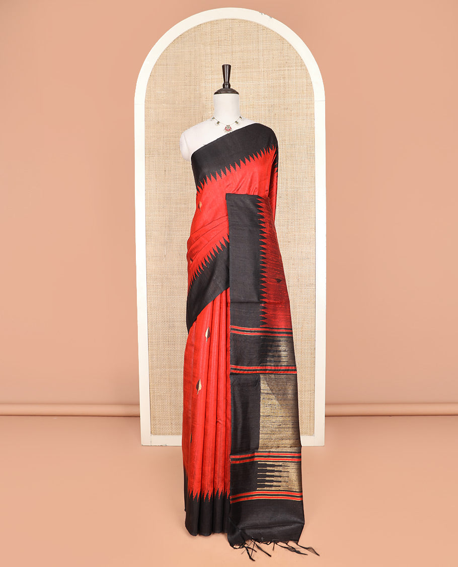 Red Dupion Silk Saree, Sparsely Sparkled with Buttas All Over Its Body, Captivating Contrast Temple Border, Zari-Woven Pallu, and Paired with a Contrast Blouse