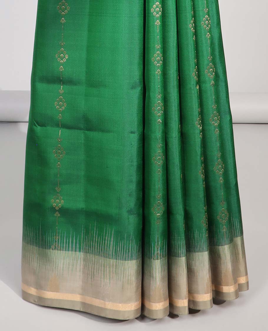 Green floral striped design soft silk saree with contrast zari border & floral vine zari design pallu