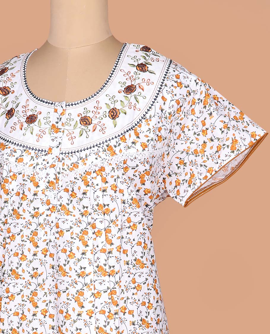 White-yellow floral vine printed with round neck floral embroidered half-sleeve cotton nighty