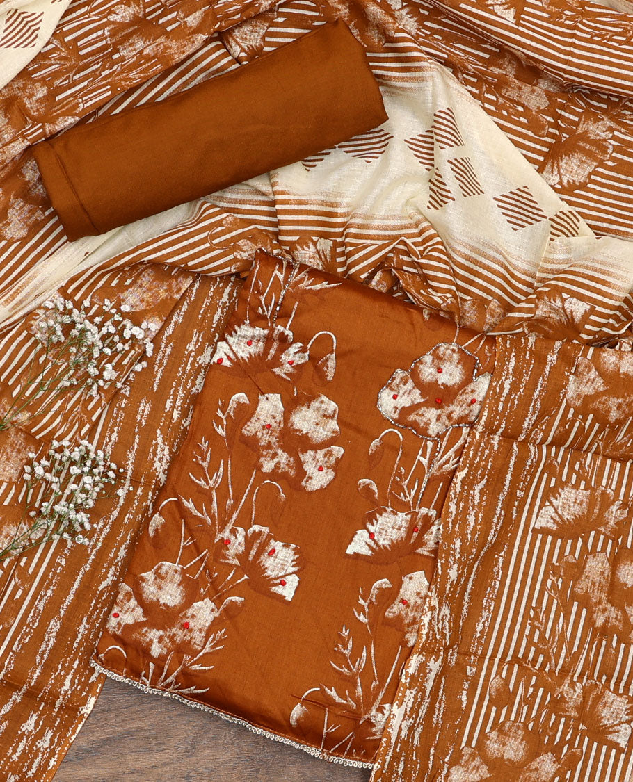 Orange material chudidar set, floral printed with French knot embroidered top, plain bottom, and dupatta of stripes and floral print