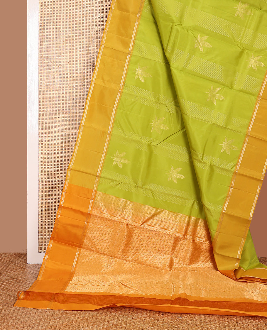 Parrot green zari design Vasundhara silk mix saree, contrast rettai pettu border of muthu designs, and jaal pallu