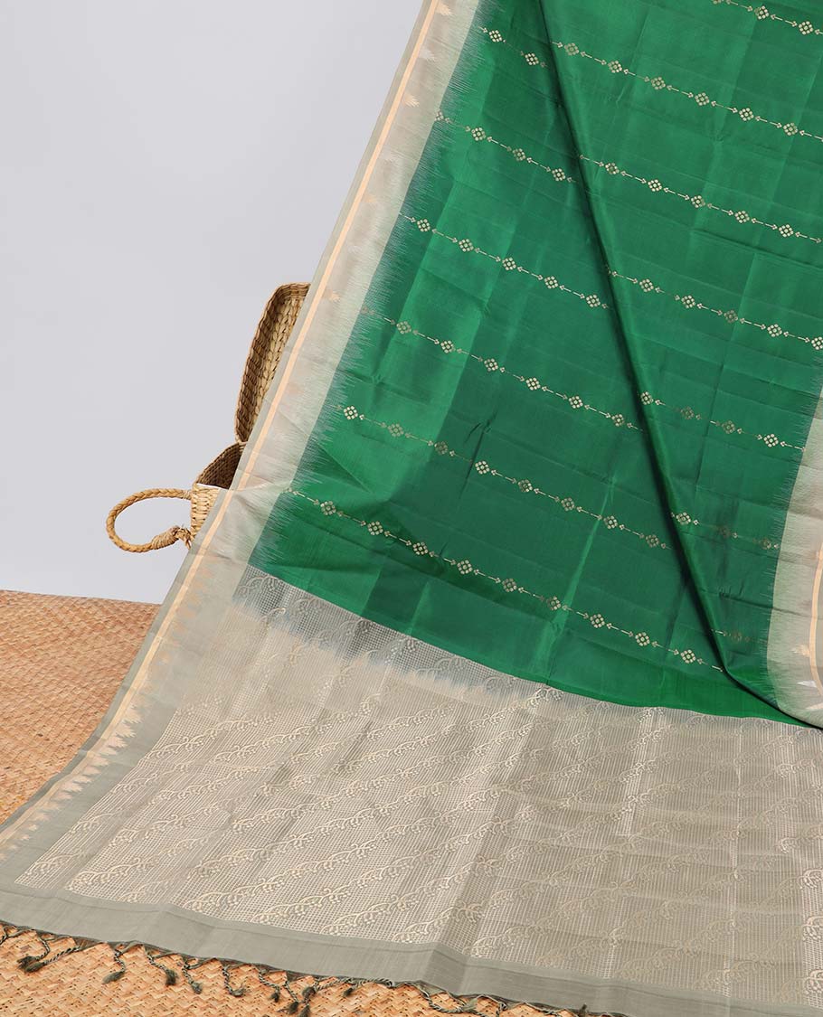 Green floral striped design soft silk saree with contrast zari border & floral vine zari design pallu