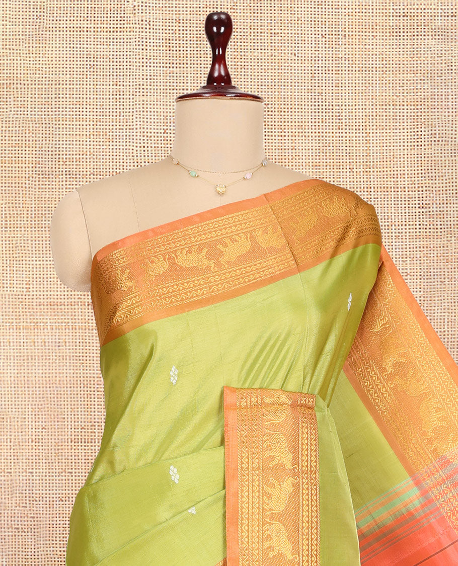 Green Banana Pith Saree, Adorned with Zari Buttas, a Contrast Traditional Zari Border, Striped Pallu, and a Contrast Blouse