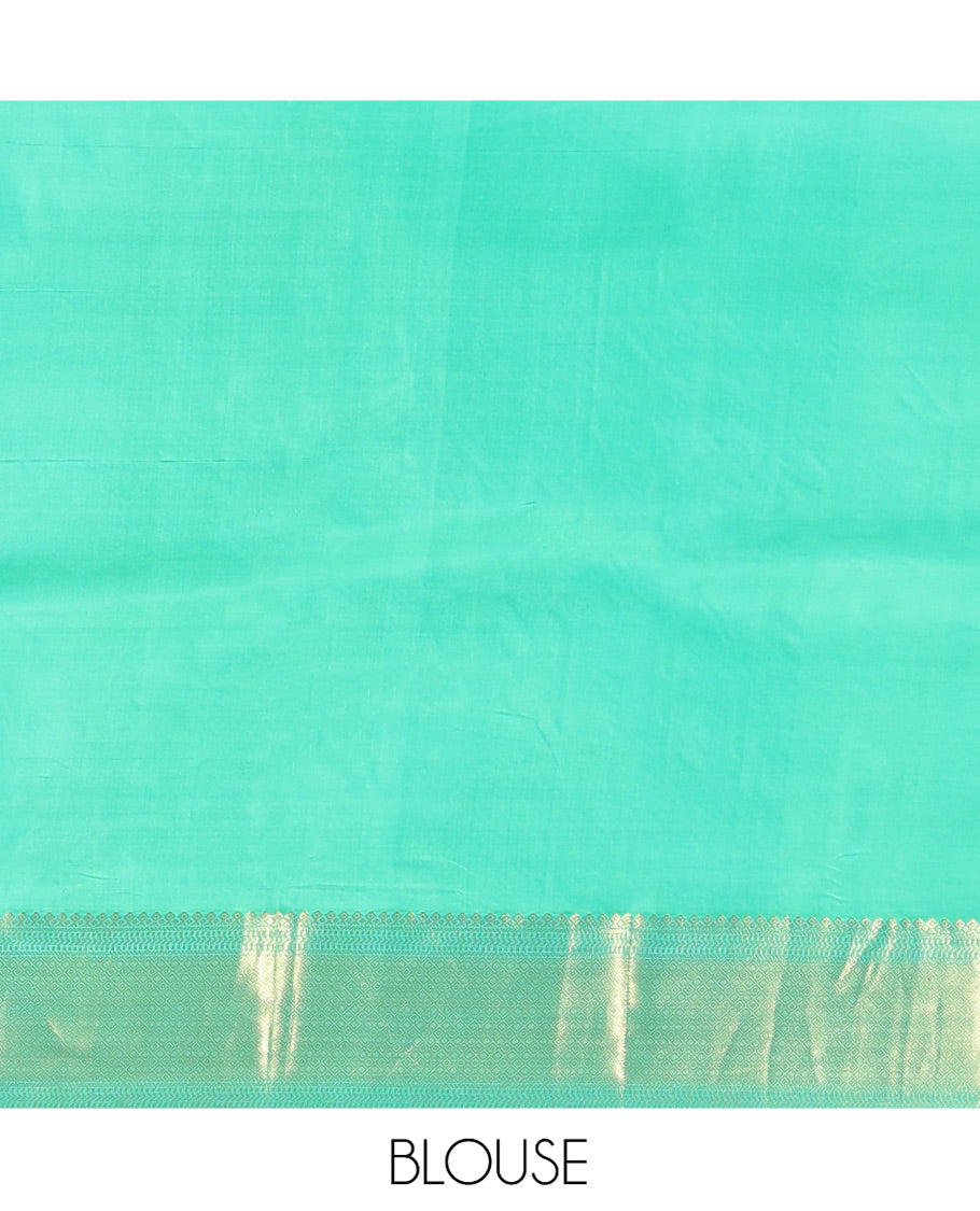 Sandal Vasundhara Silk Saree, Woven with Zari Buttas All Over Its Body, Complemented by a Contrast Border of Jada Nagam, and Kodi Visiry Designs, Intricately Designed Pallu, and Paired with a Contrast Blouse