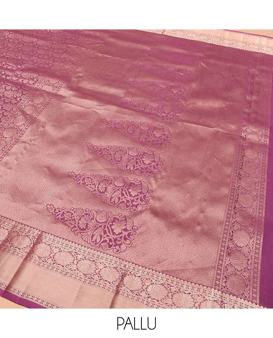 Purple Kanchipuram Wedding Silk Saree Meticulously Crafted with Jacquard Designs, Highlighted with Zari Border of Kodi Visiry Designs, Artfully Detailed Pallu of Mughal-Style Floral Designs, and Paired with a Matching Blouse