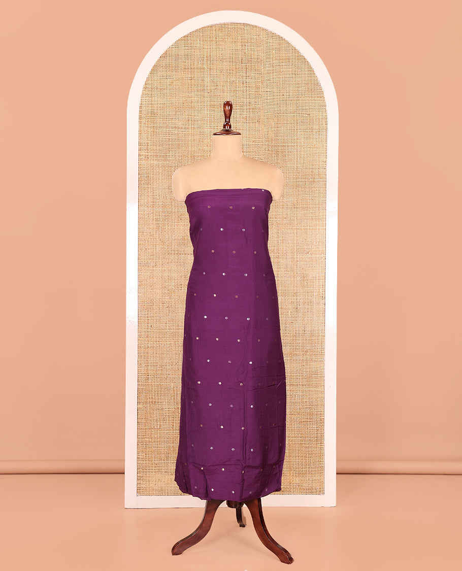 Dark Purple Semi-Silk Material Churidar Features Zari Buttas Skirt, a Plain Bottom, and a Floral Motif Zari Woven Dupatta