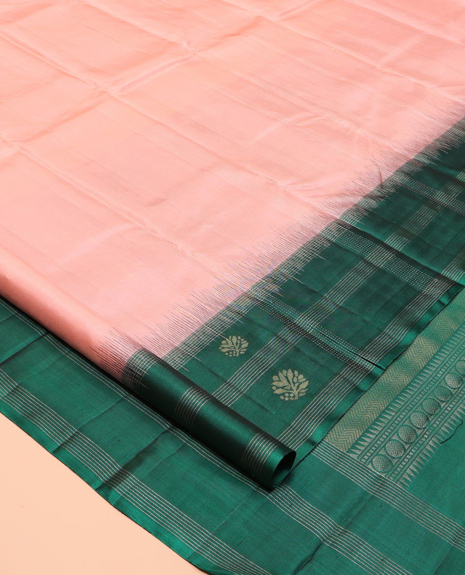 Peach Kanchipuram Silk Saree, Sparsely Sparkled with Buttas, Contrast Uniquely Designed Border, Chevron Striped Pallu, and a Contrast Blouse
