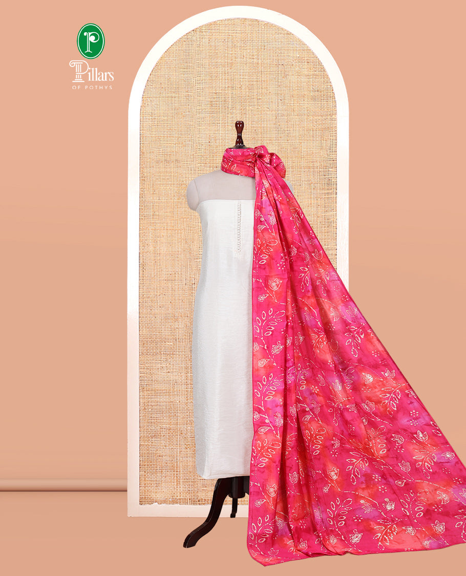 Cream-Ranipink Kerala Cream Mul Chanderi Material Churidar Features Pom-Pom Neckline Top, a Contrast Batik Floral Printed Bottom, and Dupatta