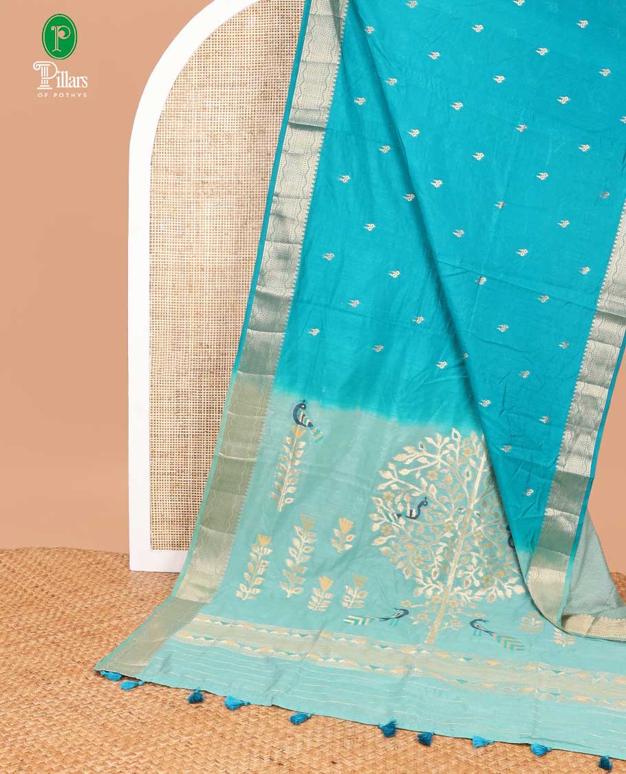 Peacock blue small butta art raw silk saree with bavanchi temple border rich pallu along with vertical stripes blouse