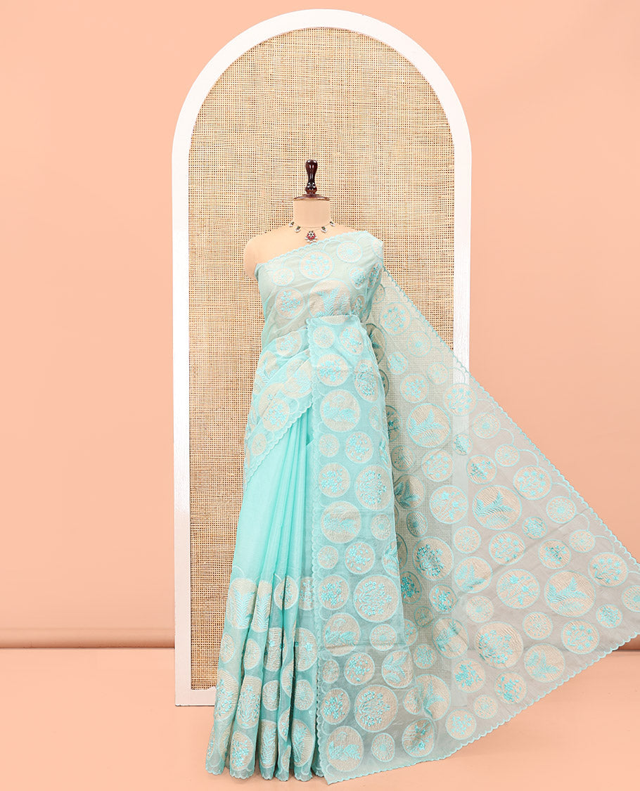 Sea Green Organza Saree, Delicately Woven with Floral Enclosed Circle Motifs Thread Embroidery, Subtle Scallop Border, Delicately Embroidered Pallu, and Paired with a Matching Embroidered Blouse