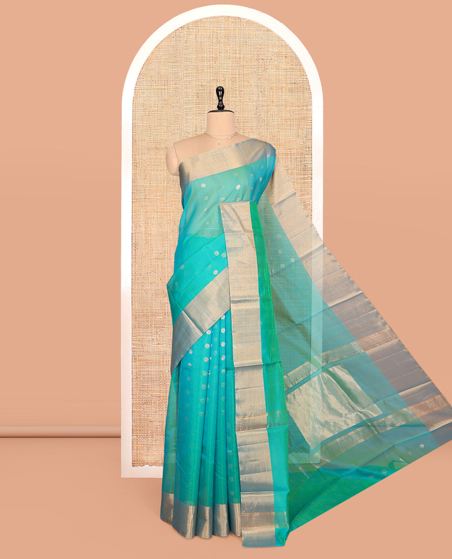 Sea Green Silk Cotton Saree, Adorned with Zari Buttas, Contrast Border, Gleaming Zari Pallu, and a Matching Blouse