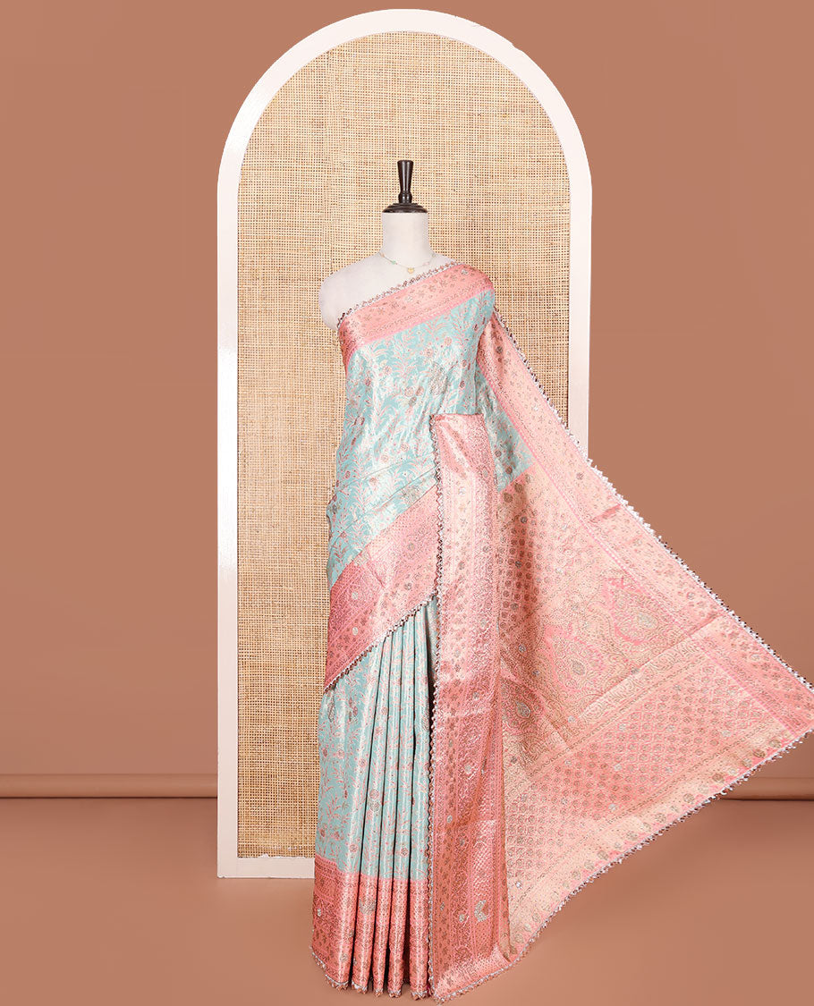 Blue Vastrakala Silk Saree Elegantly Highlighted with Floral Jacquard and Stone Work, Complemented by Contrast Traditional Zari and Stone Embroidered Scallop Border, Mughal-Style Zari Woven Stone Work Pallu, and Paired with Contrast Stone Work Blouse