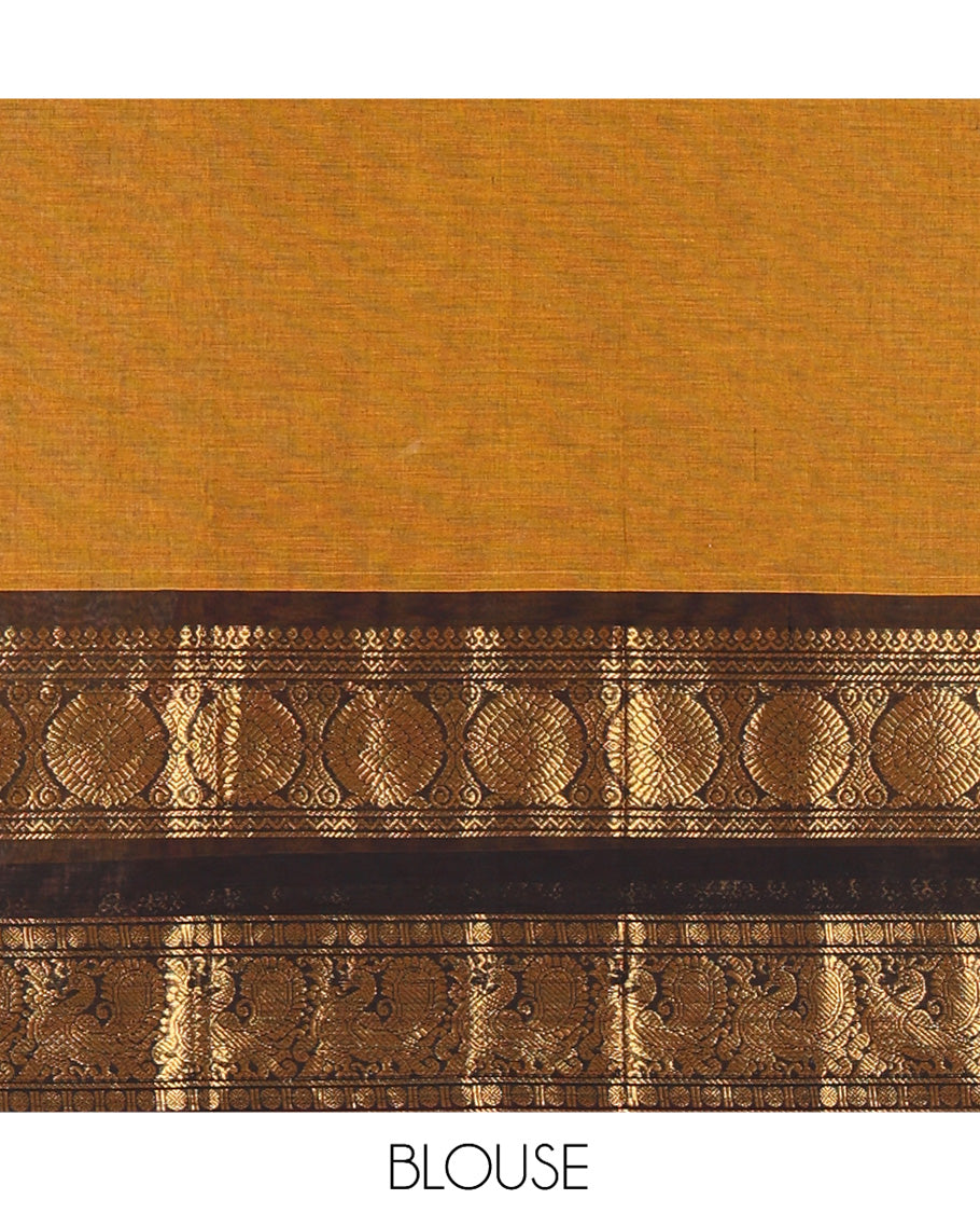 Mustard Plain Chettinad Cotton Saree, Complemented by a Contrast Peacock-Chakram Rettai Pettu Border, and a Matching Blouse